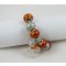 Silbernes Armband mit orangefarbenen Perlen und Schleife