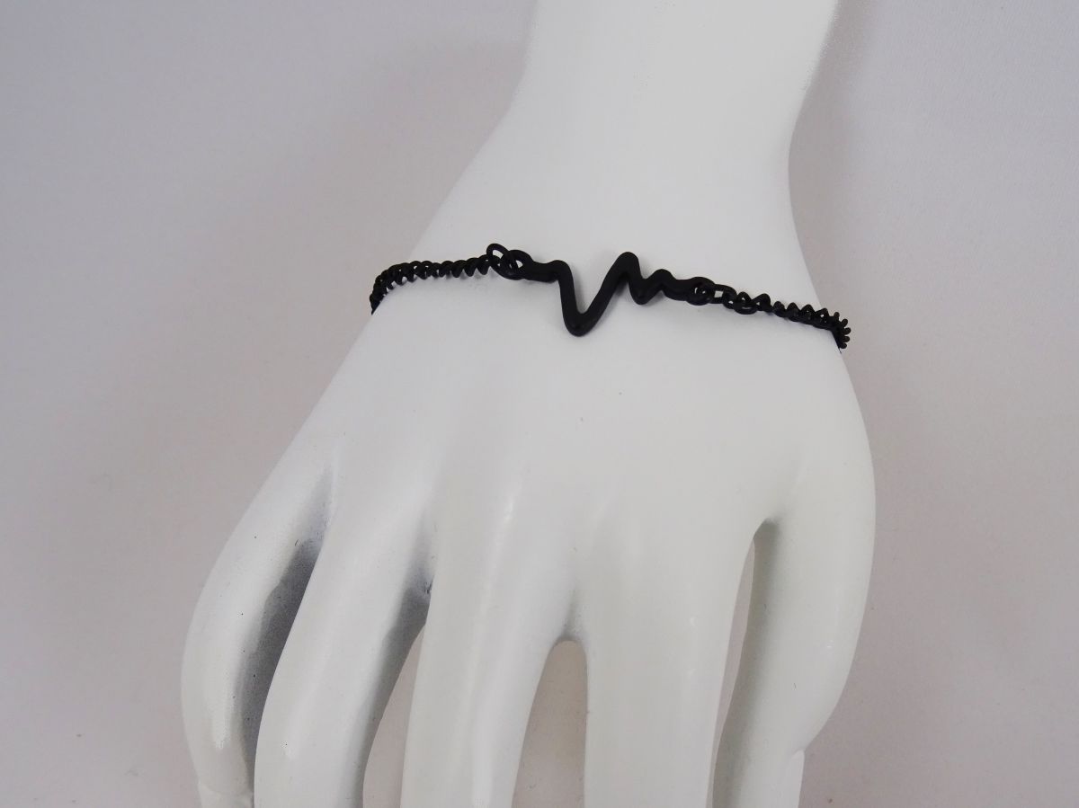 Feines schwarzes Armband Design Ondes