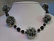 Collier de f&ecirc;te pompons argent&eacute;s