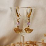 Ohrringe Goldene Oisillons violette Perlen